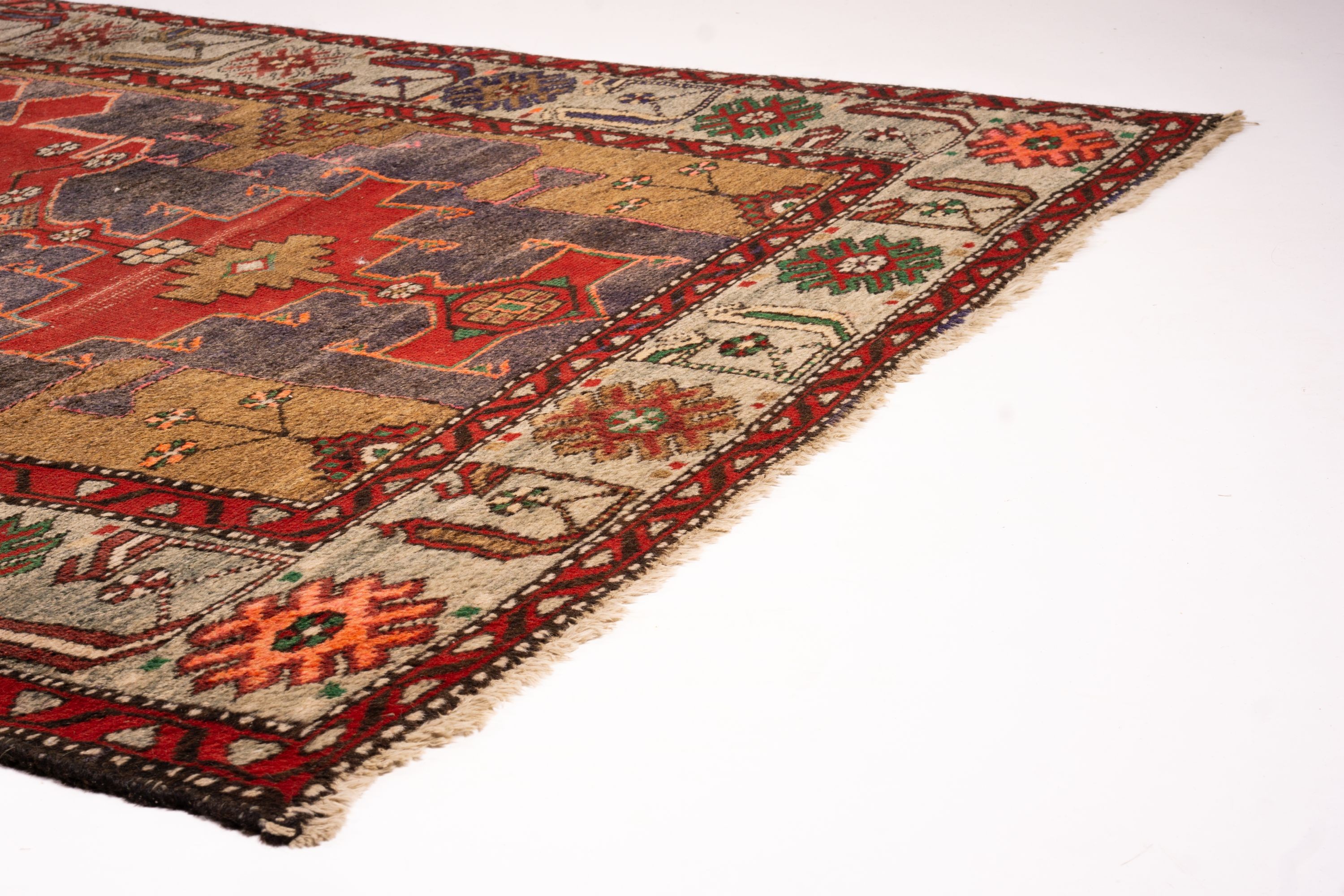 A Caucasian Kazak blue ground rug, 206 x 128cm